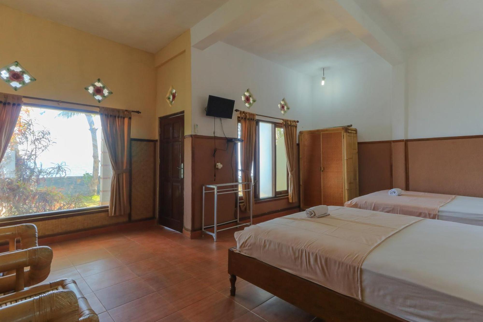 Hotel Tara Bar & Resto Air Sanih Kubutambahan  Pokoj fotografie